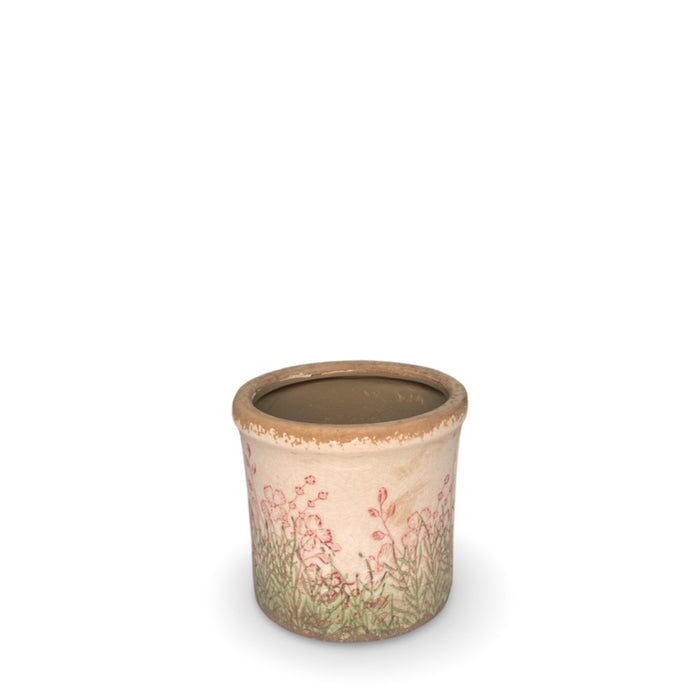 Potteskjuler med blomsterdekor