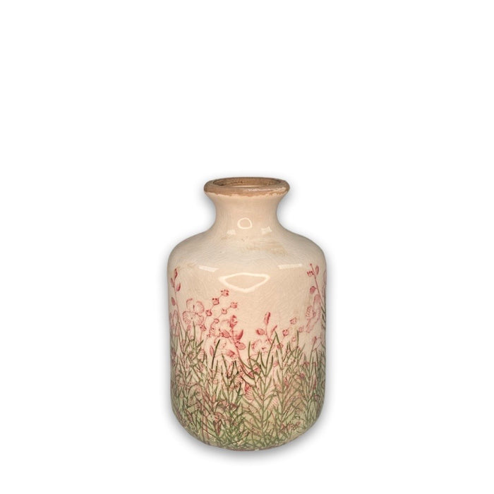 Vase med blomsterdekor
